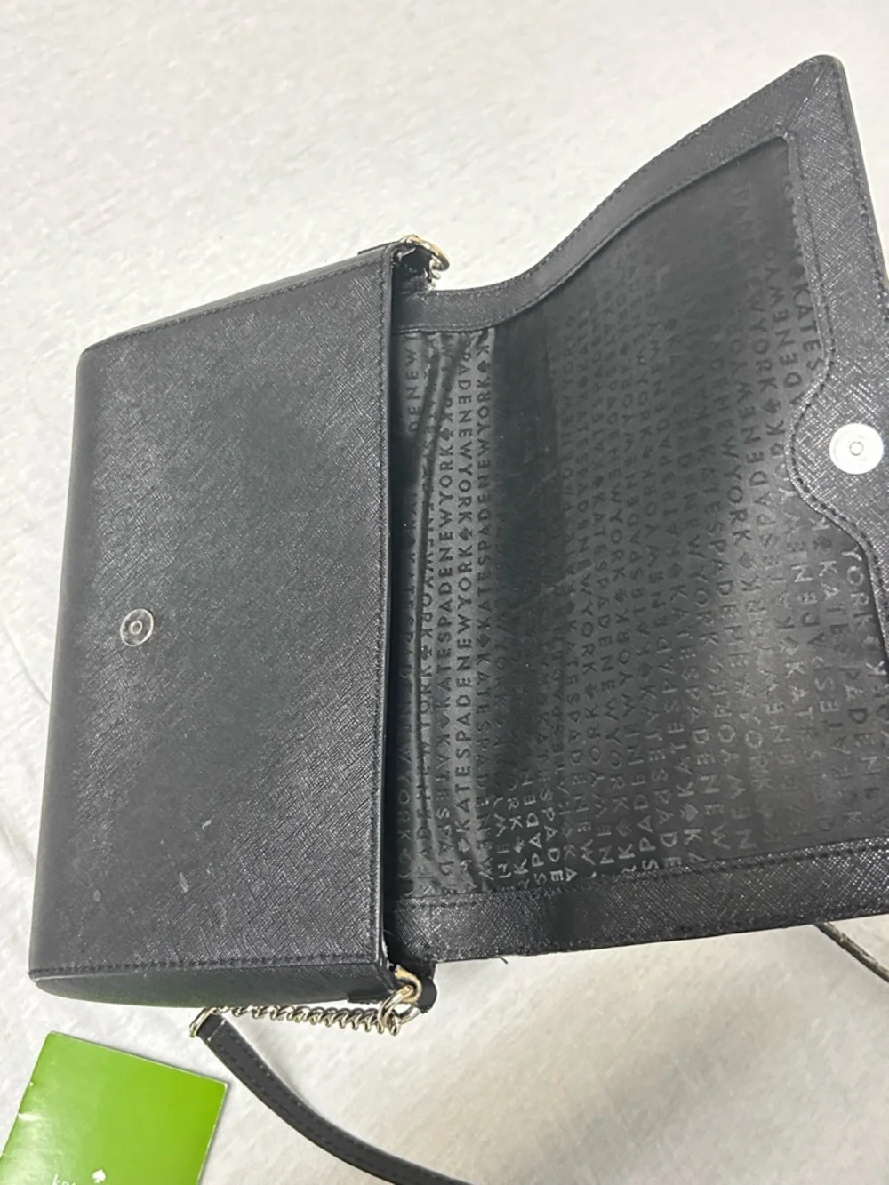 kate spade black leather crossbody with gold chain